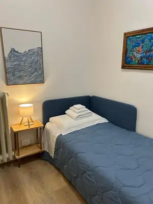Letto o letti in una camera di CIVICO 7 Al Santo Ospedali