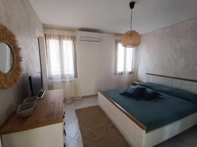 Letto o letti in una camera di CA'pPERINI