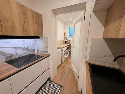 Cucina o angolo cottura di App4rent Family House Sea View - Cima 7