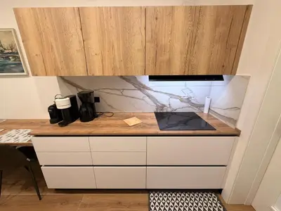 Cucina o angolo cottura di App4rent Family House Sea View - Cima 7