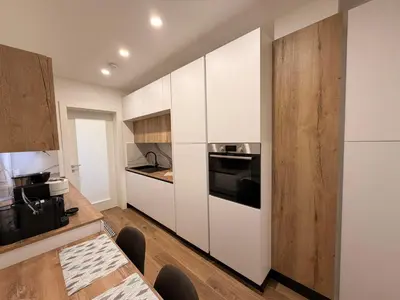 Cucina o angolo cottura di App4rent Family House Sea View - Cima 7