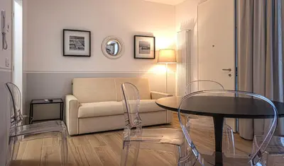 Area soggiorno di Villa Oleandro Family Apartments-Leresidenzedijesolo