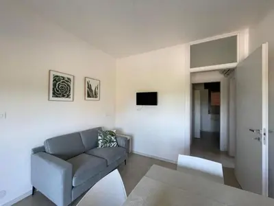Area soggiorno di Apartment near the beach in Rosolina Mare