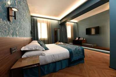 Letto o letti in una camera di Rosa Salva Hotel