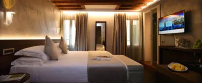 Letto o letti in una camera di Rosa Salva Hotel