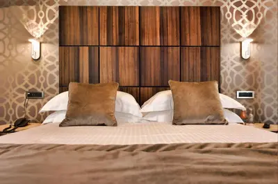 Letto o letti in una camera di Rosa Salva Hotel