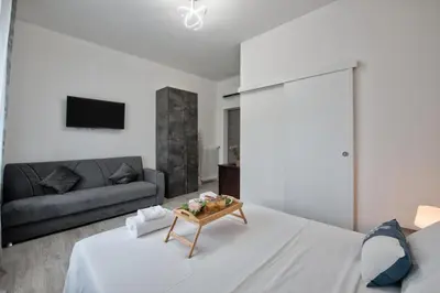 Letto o letti in una camera di La Venezia Station Residence Mestre