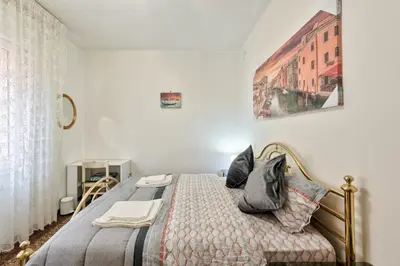 Letto o letti in una camera di City Living Guest House Venice Room