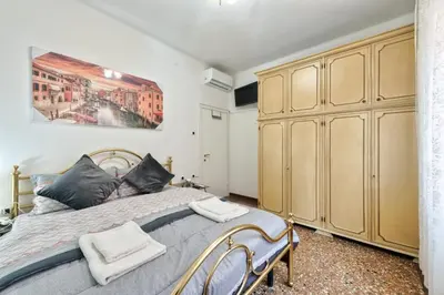 Letto o letti in una camera di City Living Guest House Venice Room