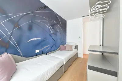 Letto o letti in una camera di The Summer Houses Apartment