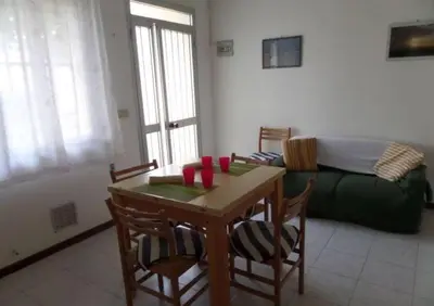 Area soggiorno di Cozy apartment in Rosolina