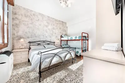 Letto o letti in una camera di Jesolo Happy Beach House - Host Solution