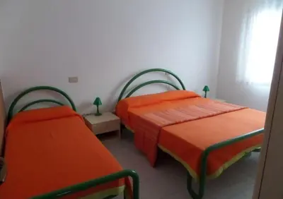 Letto o letti in una camera di Welcoming apartment in Rosolina