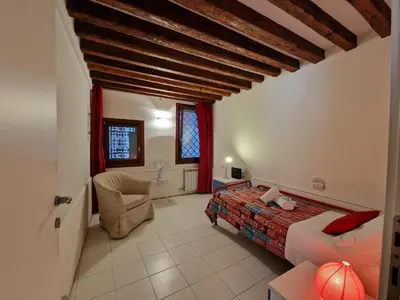 Area soggiorno di Veneziacentopercento Rooms