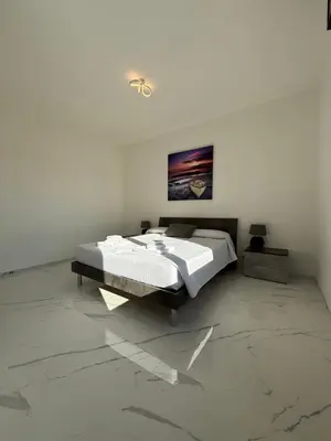 Letto o letti in una camera di Residence La Pace