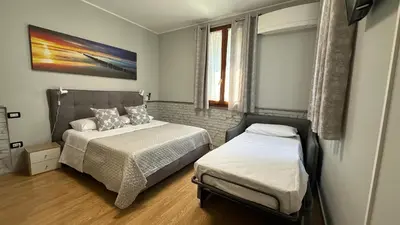 Letto o letti in una camera di My Tiny Home Venice
