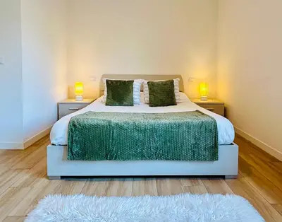 Letto o letti in una camera di Cozy Apartment 10 min to Venice by Tram & Free Parking