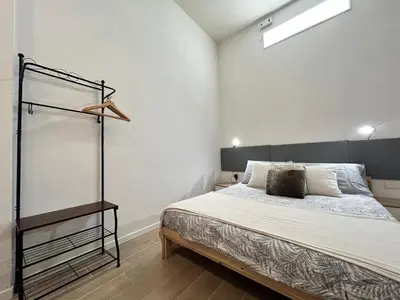Letto o letti in una camera di Mini Loft - convenient for Venice