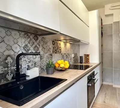 Cucina o angolo cottura di Modern Suite 10 min to Venice & Private Parking