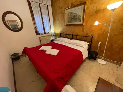 Letto o letti in una camera di The Venetian Resort Royalclass