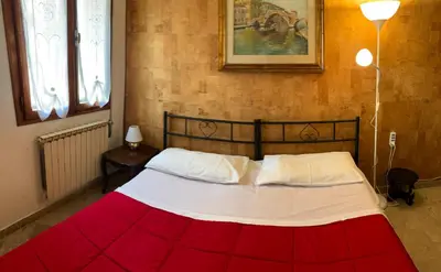 Letto o letti in una camera di The Venetian Resort Royalclass