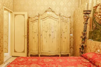 Letto o letti in una camera di Canal View San Marco Rialto - Dogaressa Palace 1872