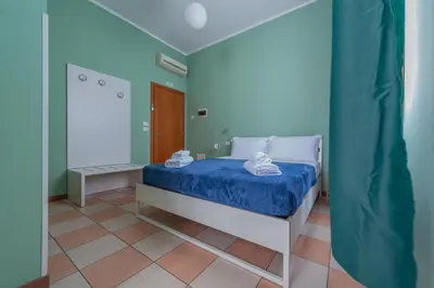 Letto o letti in una camera di Marconi Lodge