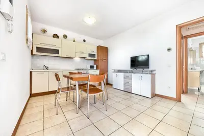 Cucina o angolo cottura di Jesolo Flowers Beach House - Host Solution
