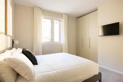 Letto o letti in una camera di PALAZZO CIVIDALE Central Luxury Home