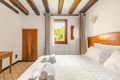 Letto o letti in una camera di Murano Glass Residence