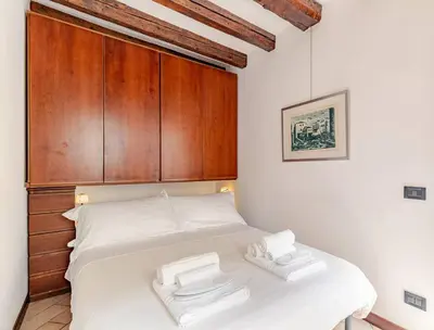 Letto o letti in una camera di Murano Glass Residence