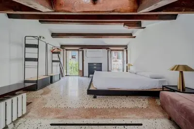 Letto o letti in una camera di Domus Estia
