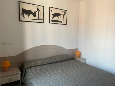 Letto o letti in una camera di Ca' Ruffoni Terrace