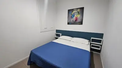 Letto o letti in una camera di Villa Veranda Quadrilocale