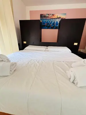 Letto o letti in una camera di L'affitta Camere di Venezia