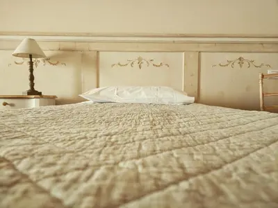 Letto o letti in una camera di Casa Camilla City