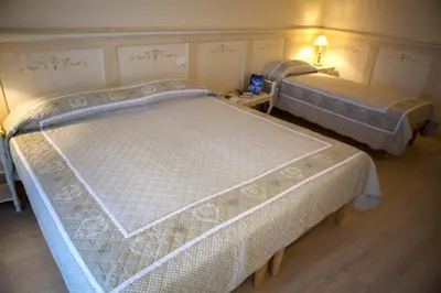 Letto o letti in una camera di Casa Camilla City