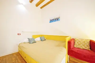 Letto o letti in una camera di Ca' Pontei Rialto WI-FI Fiber