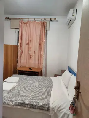 Letto o letti in una camera di Bella cina
