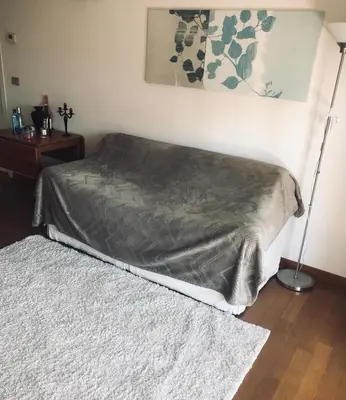 Letto o letti in una camera di Camera privata con bagno su appartamento condiviso