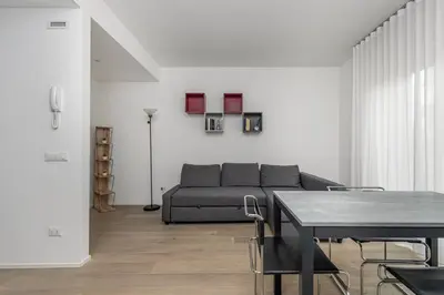 Area soggiorno di GuestHost - Charming Apartment in Venezia Mestre