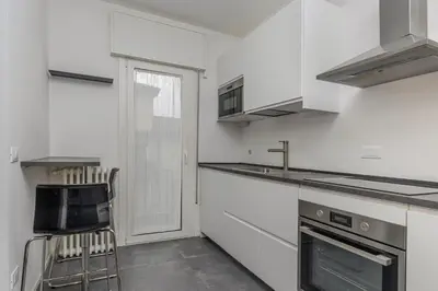 Cucina o angolo cottura di GuestHost - Charming Apartment in Venezia Mestre