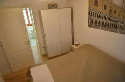 Letto o letti in una camera di Ca Vellione cozy apt Noale