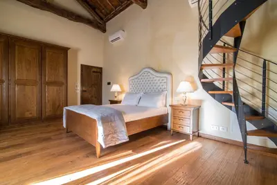 Letto o letti in una camera di Ca' Salva Rustic Charme