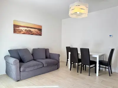 Area soggiorno di Enia - Carraro Immobiliare - Family Apartments