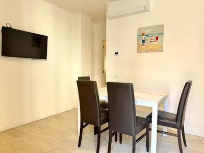TV o dispositivi per l'intrattenimento presso Enia - Carraro Immobiliare - Family Apartments