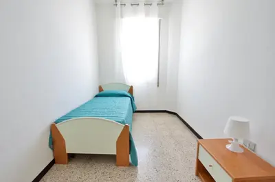 Letto o letti in una camera di Centro Commerciale Apartments