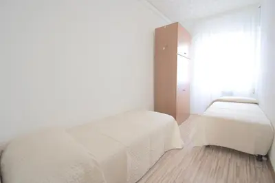 Letto o letti in una camera di Tiziana Apartments