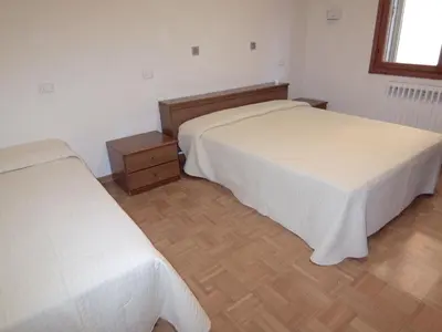 Letto o letti in una camera di Tiziana Apartments