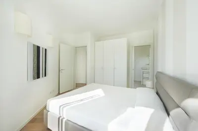 Letto o letti in una camera di Villaggio dei Pellicani Apartments